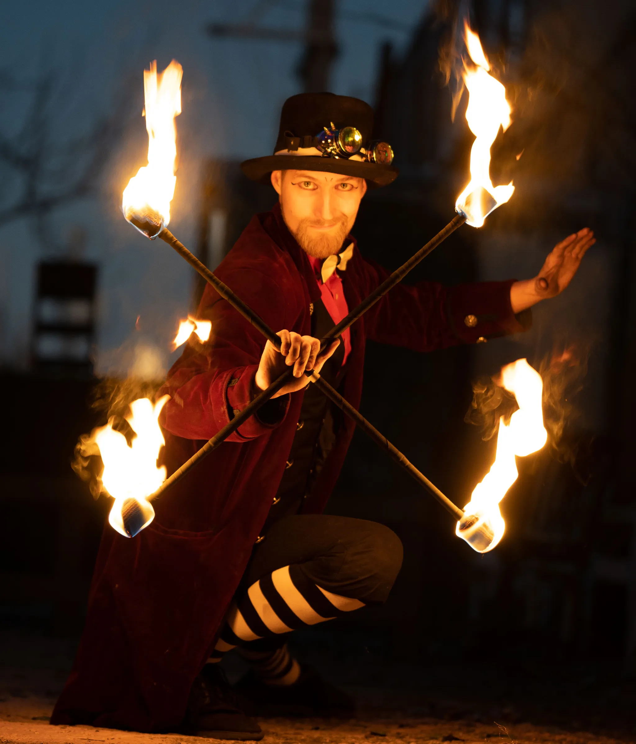 Austen Cloud performing with fire props